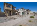 New construction neighborhood with sidewalks and gravel yards creating a clean and modern aesthetic at 15595 S 181St Dr, Goodyear, AZ 85338