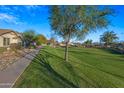 Peaceful community with lush green spaces and walking paths at 1724 S Rockwell St, Gilbert, AZ 85295