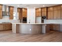 Modern kitchen featuring custom cabinetry, sleek countertops, and state-of-the-art stainless steel appliances at 1296 E Coconino Way, Gilbert, AZ 85298