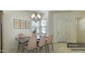 Bright dining room with table and chairs, ready for gatherings at 2533 N 149Th Ln, Goodyear, AZ 85395