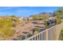 Landscaped common area with mountain views in a residential community at 4336 S Pony Rider Trl, Gold Canyon, AZ 85118