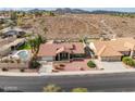 Charming single-story home featuring a tile roof, two-car garage, and low-maintenance desert landscaping at 1017 E Grandview Rd, Phoenix, AZ 85022