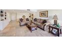 Spacious living room with tile flooring and comfortable seating arrangement at 5122 N 31St Way # 244, Phoenix, AZ 85016
