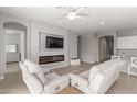 Spacious living room featuring a fireplace and comfortable seating at 4287 E Clifton Ave, Gilbert, AZ 85295