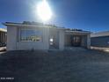 New construction home exterior showcasing backyard at 4301 E Bradford Ave, San Tan Valley, AZ 85143