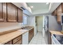 Kitchen features wood cabinets, and stainless steel appliances at 13235 N 25Th Dr, Phoenix, AZ 85029