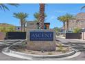 Community entrance sign at Ascent at the Phoenician with lush landscaping and contemporary design elements at 5000 E Camelback Ridge Rd # 204, Scottsdale, AZ 85251