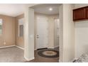 Inviting home foyer with decorative flooring and views into other rooms at 10065 E Thatcher Ave, Mesa, AZ 85212