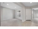 Bright and airy entryway with tile flooring and neutral color palette at 22531 E Orchard Ln, Queen Creek, AZ 85142