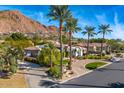 Stunning home nestled in a mountainside community with palm trees at 5112 E Pasadena Ave, Phoenix, AZ 85018