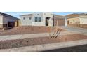 Contemporary single-story home featuring minimalist landscaping and a two car garage at 28958 N 174Th Ln, Surprise, AZ 85387