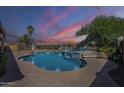 Beautiful backyard pool area featuring a well-maintained pool with an in-ground spa and lounge chairs at 3414 E Virgil Dr, Gilbert, AZ 85298