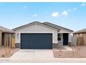 Charming single-Gathering home featuring a two-car garage and neutral colored exterior at 3175 E Hayden Rose Ave, San Tan Valley, AZ 85143