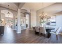 Elegant dining room with hardwood floors and a chandelier at 4565 E Pinnacle Vista Dr, Cave Creek, AZ 85331