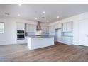 Spacious kitchen featuring an island and stainless steel appliances at 876 W Golden Ore Pass, Apache Junction, AZ 85120