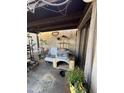 Covered patio with seating and pet furniture at 211 E Loma Linda Blvd # 2, Avondale, AZ 85323