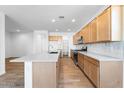Bright kitchen features a spacious island, ample counter space, and modern appliances at 25238 N 172Nd Ln, Surprise, AZ 85378