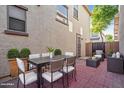 Outdoor patio with seating area and dining table, perfect for entertaining at 1670 E Joseph Way, Gilbert, AZ 85295