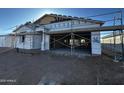 New construction home exterior, showcasing a modern design and two-car garage at 4317 E Bradford Ave, San Tan Valley, AZ 85143