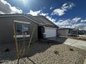 Lovely single-story home featuring a two-car garage and a beautifully rock landscaped front yard at 4317 E Bradford Ave, San Tan Valley, AZ 85143