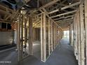 Interior framing of a new home, showing the structure and layout of the rooms at 4317 E Bradford Ave, San Tan Valley, AZ 85143