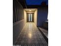 Modern entryway with patterned tile floor and double door entry at 8544 E Heatherbrae Ave, Scottsdale, AZ 85251