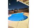 Inviting backyard pool with lighting and patio at 965 N 87Th Way, Scottsdale, AZ 85257