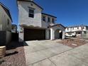 Two-story house with a two-car garage and front yard at 2200 N Iowa St, Chandler, AZ 85225