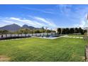 Expansive backyard with a large, refreshing pool and spa, featuring mountain views at 6541 N 48Th St, Paradise Valley, AZ 85253