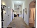 Bright entryway with view of living room and hallway at 2101 S Meridian Rd # 205, Apache Junction, AZ 85120