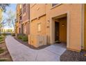 Front entrance of townhouse with walkway and landscaping at 900 S 94Th St # 1065, Chandler, AZ 85224