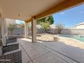 Inviting backyard oasis with a refreshing pool and patio at 1342 N Mckenna Ln, Gilbert, AZ 85233