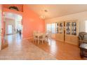 Dining room with hardwood floors and built-in hutch at 1342 N Mckenna Ln, Gilbert, AZ 85233