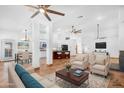 Open living room features a spacious layout, tile flooring, and neutral color palette at 8546 E Brittle Bush Rd, Gold Canyon, AZ 85118