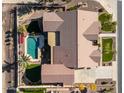 Aerial view showcases a private pool, patio, and well-maintained backyard at 21774 E Camacho Rd, Queen Creek, AZ 85142