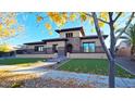 Two-story home with stone accents and landscaping at 2285 E Mead Dr, Gilbert, AZ 85298