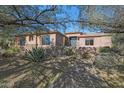 Front view of a beautiful one-story home at 6486 E Oberlin Way, Scottsdale, AZ 85266