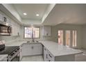 Updated kitchen boasts white cabinetry and quartz countertops at 3753 S Mill Ave, Tempe, AZ 85282