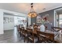 Elegant dining room features a large wooden table and decorative accents at 1358 N St Paul --, Mesa, AZ 85205