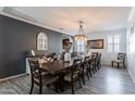 Spacious dining room with large table and chandelier at 1358 N St Paul --, Mesa, AZ 85205