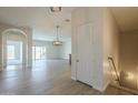 Bright living room showcasing modern flooring and an open floor plan layout at 3948 W Salter Dr, Glendale, AZ 85308