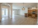 Spacious living room featuring modern floors, lighting, and an open concept design at 3948 W Salter Dr, Glendale, AZ 85308