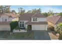 Two-story house with tile roof and attached garage at 2235 E Lakecrest Dr, Gilbert, AZ 85234