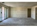 Large living area with sliding glass doors and ample space for customization and interior design at 7631 W Tether Trl, Peoria, AZ 85383