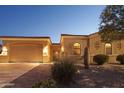 Front view of single-story home with desert landscaping at 12866 S 183Rd Ave, Goodyear, AZ 85338