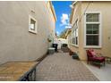 Private backyard with brick pavers and seating area at 2251 S Annie Ln, Gilbert, AZ 85295