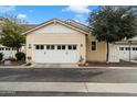 Two car garage with white doors and American flag decor at 2251 S Annie Ln, Gilbert, AZ 85295