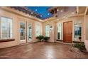 Outdoor patio with string lights, creating a cozy ambiance at 1840 W Sierra Sunset Trl, Phoenix, AZ 85085