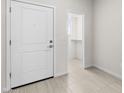 Light and bright entryway with tile flooring and a closet view at 7504 S 75Th Dr, Laveen, AZ 85339