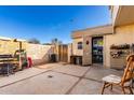 Back patio with storage and access to the interior at 4625 E Southgate Ave, Phoenix, AZ 85040